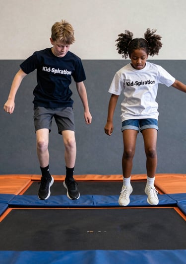 A vibrant display of colorful custom t-shirts with bold, playful designs hanging on a rustic wooden rack.