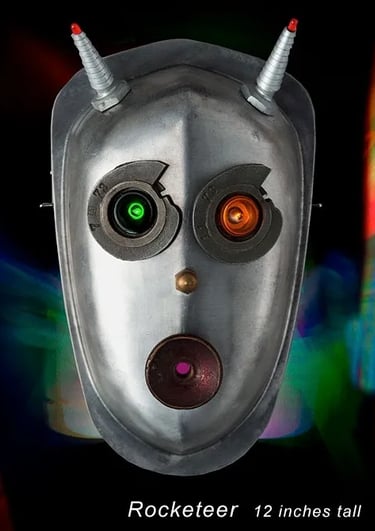 Assemblage robot head named Rocketeer built by sculptor Tal Avitzur.
