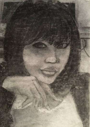 charcoal self portrait. black girl artist