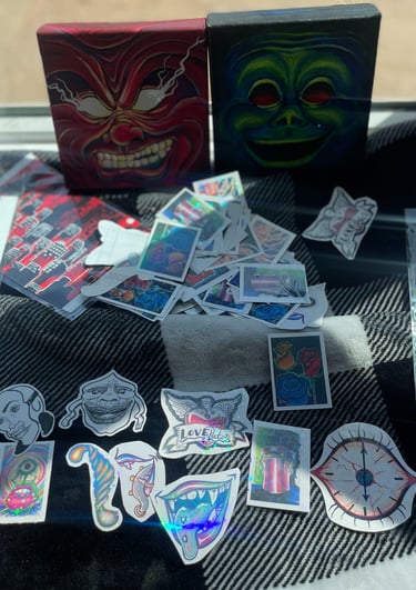 image of handmade stickers, art prints, and paintings