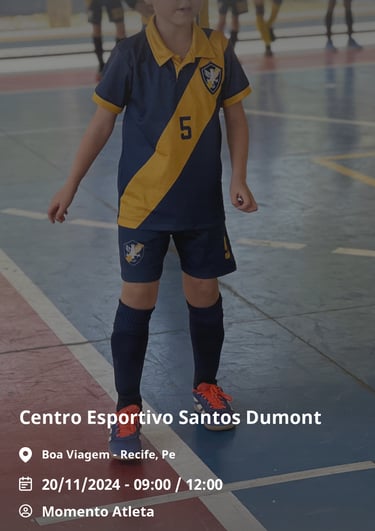 a young boy in a soccer uniform is playing soccer