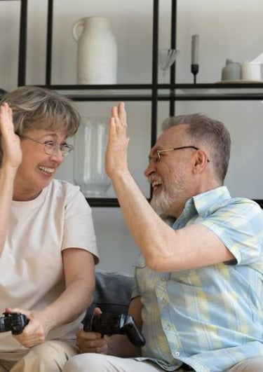 a man and woman sitting on a couch