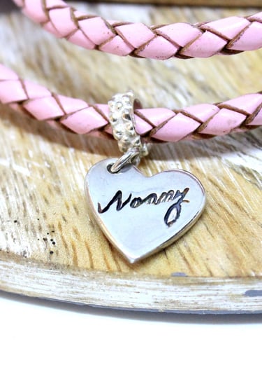 Memorial heart charm. Silver with your loved ones handwritten name on the front.