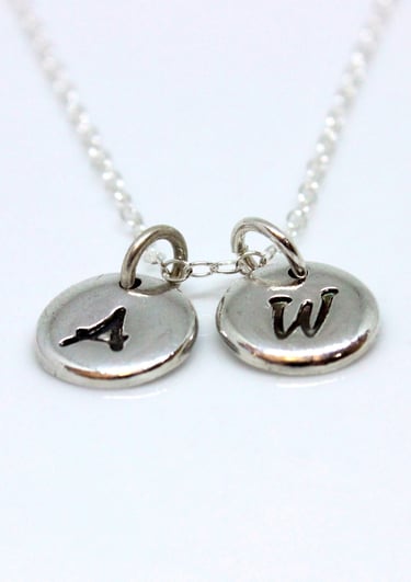 Personalised Jewellery. Silver jewellery with your words, initials & names stamped into the surface