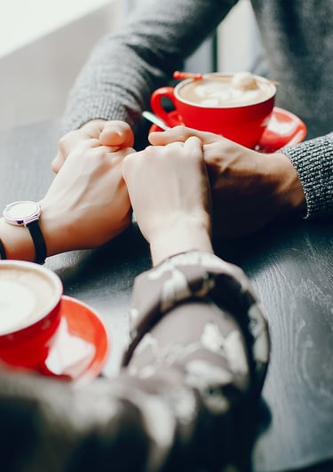 Cute couple spend time in a cafe