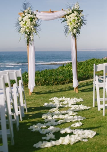 wedding arbor with white flowers at cuvier park, la jolla