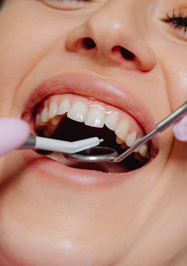 Dental surgeon performing gum surgery to treat gum disease and restore healthy gum tissue