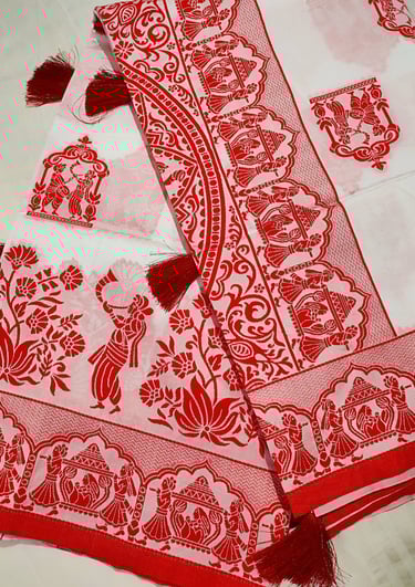 Selection of beautifully woven handloom textiles, highlighting rich colors and traditional craftsmen