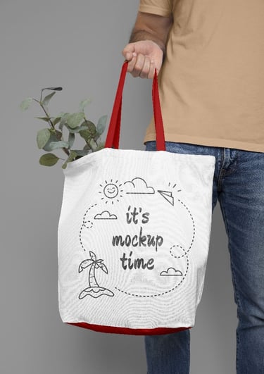a person holding a tote bag with a plant in it