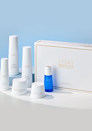 a box of skin care products including a bottle ATOMY of lotion