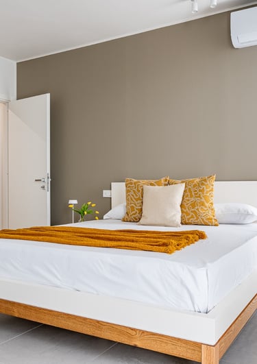 letto king per soggiorni brevi confortevoli con aria condizionata