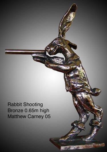 a rabbit shooting a gun 