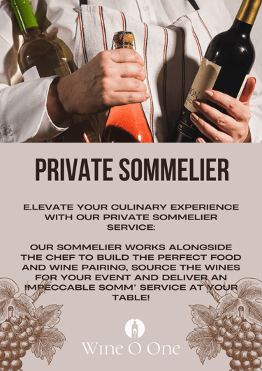 A sommelier holding a bottle of wine