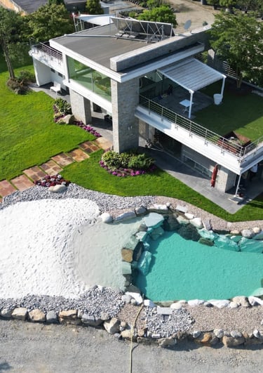 realizzazione piscina naturale rocks design su villa a sabaudia edil leonardo