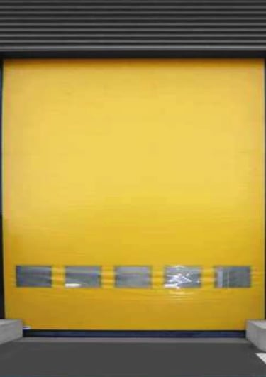 a yellow door with a yellow door and a parking lot