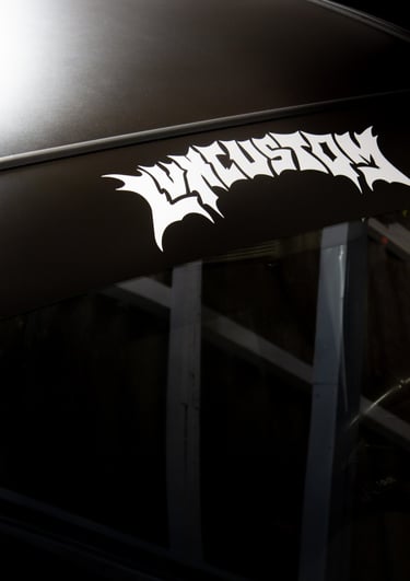 a car with a sticker on the side of it