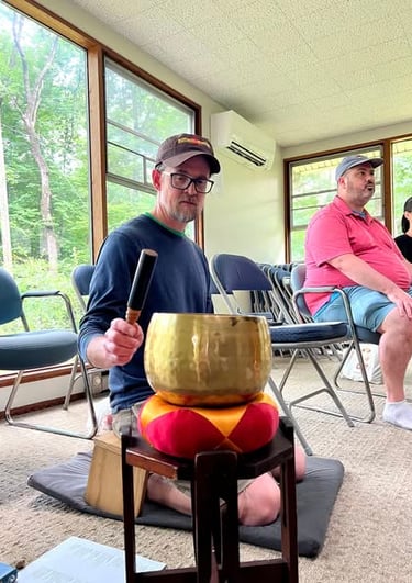 image of sangha ringing meditation bell