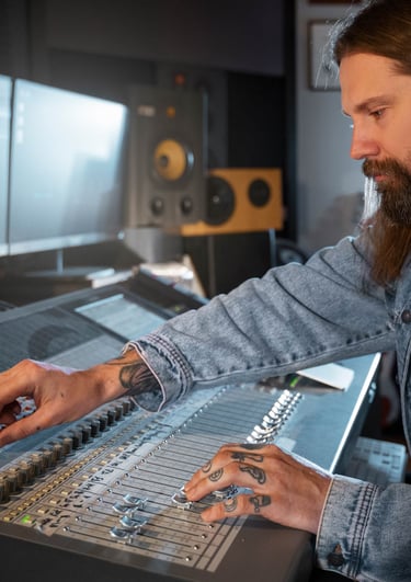 Sound engineer adjusting audio mixer during live event setup – Sonus Dubai onsite AV technician