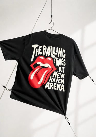 Vintage The Rolling Stones black graphic t-shirt featuring the iconic red lips logo hanging on a wall.
