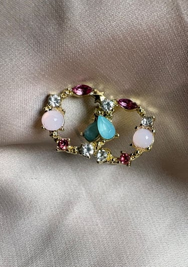 a ring with a peace sign and a peace sign