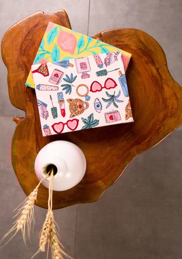 a small house with a paper house on a table