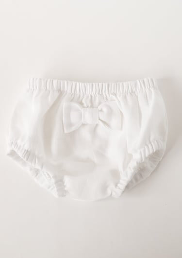 a baby diaper pants with a bow tie