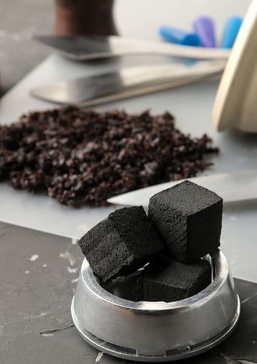 Cubes coconut shell charcoal ready to burn