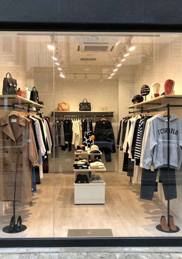 Assorted buttons and flowers arranged artistically on black velvet