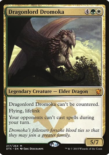 Dragonlord Dromoka Magic the Gathering trading card featuring a massive armored elder dragon sitting on a cliff side.