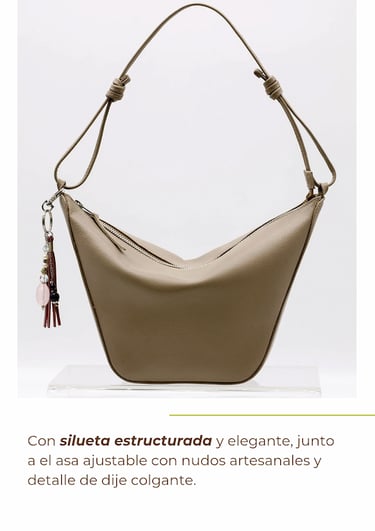 a purse with a tassell and a tassell