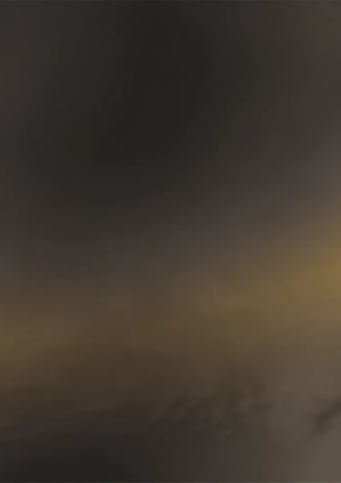 a man riding a skateboard down the side of a ramp