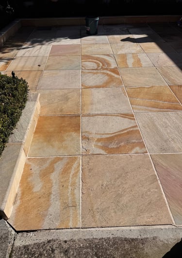 algae and mould removed sandstone tiled floor