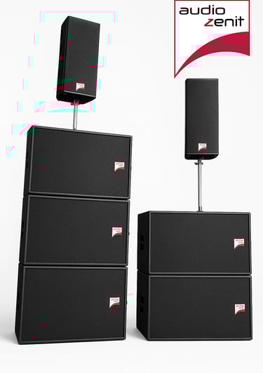 a pair of speakers with a red ribbon around the bottom