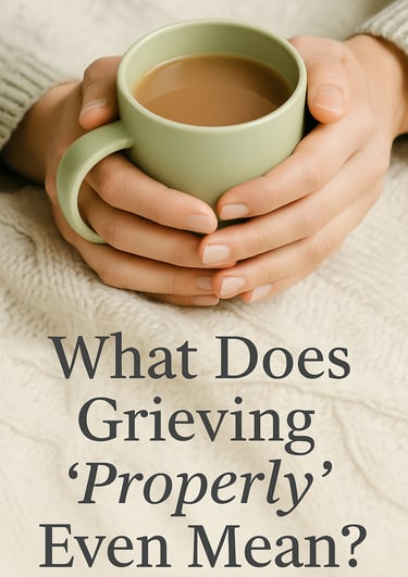 Hands holding a pale green mug of tea on a soft knitted blanket, with the text ‘What Does Grieving ‘