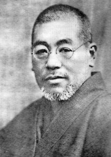 Black and white Photo of "Dr. Usui" with glasses