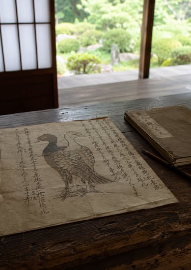 Vintage Japanese ink drawing of a bird on parchment paper inside a traditional temple room.