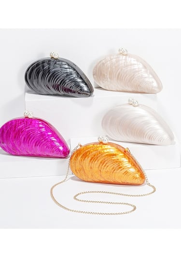 a purse with a chain and a chain link