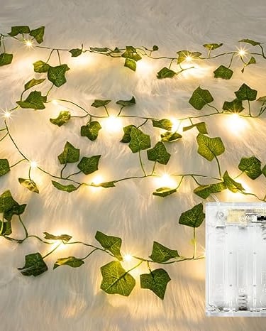 a white light bulb string lights up in a room