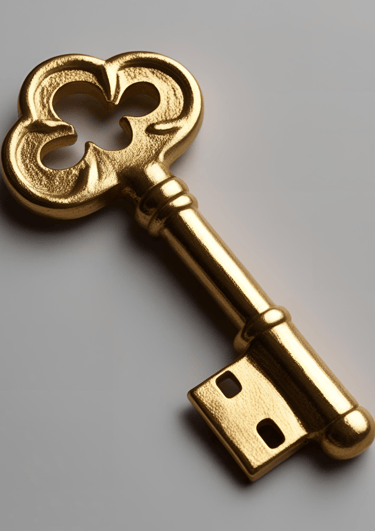 a golden keyhole keychaik with a keyhole in the middle