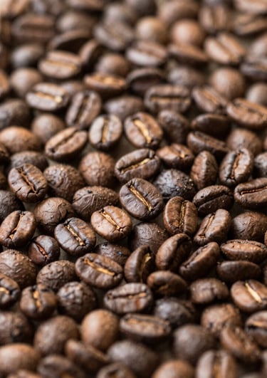 A variety of colorful drip coffee bags arranged on a rustic wooden table.