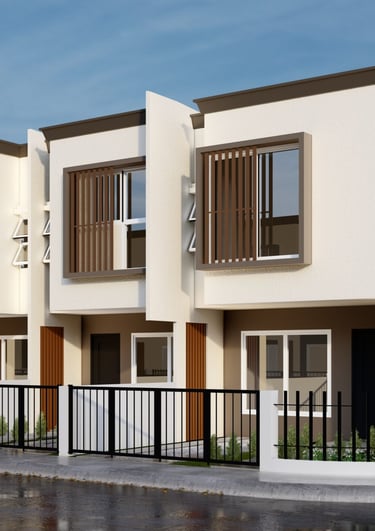 Modern two-story white townhouse units with brown accents and black metal fencing.