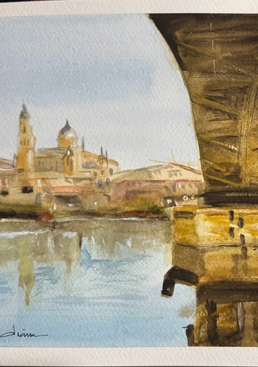 a painting of the Salamanca University seeing from the bridge