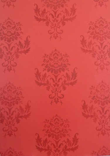 Décoration murale peinte avec des motifs rappelants les tissus damassés.