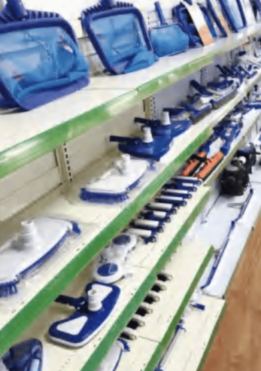 pool equipment company nets and poles on shelves