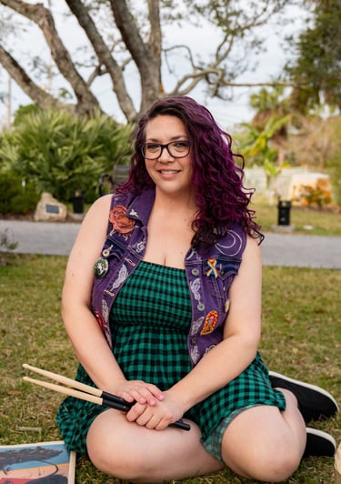 Self portrait, purple hair, smiling, green dress, purple vest