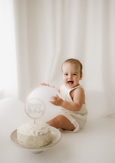 toddler with his 1st birthday cake in Adelaide Hills studio