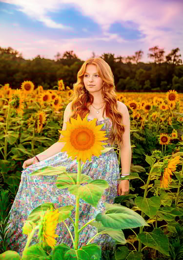 Senior Picture in a sunflower field by a professional senior picture photographer in Lancaster PA