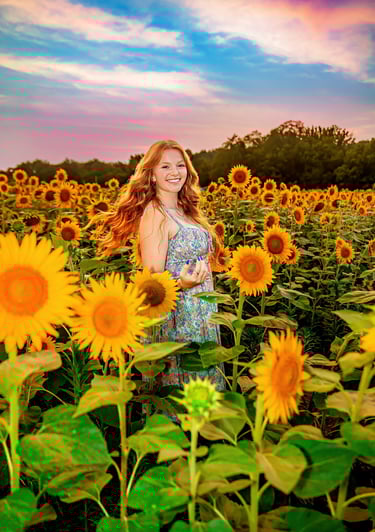 Senior Picture in a sunflower field by a professional senior picture photographer in Central PA