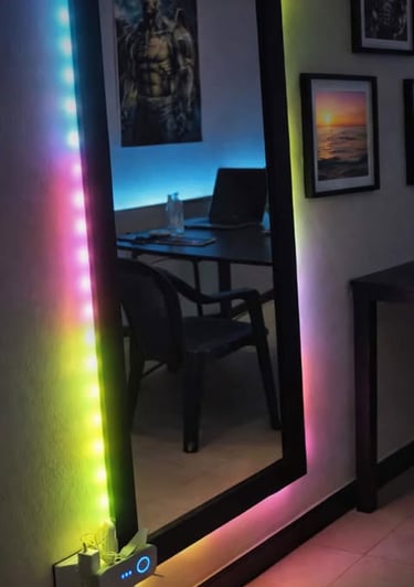 LED light strip framing a full-length mirror, casting colorful ambient lighting in a modern room