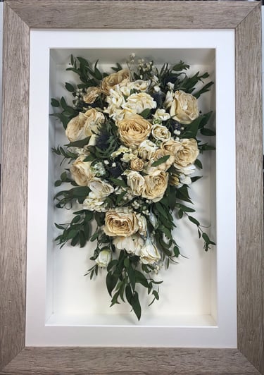 winter white trailing view preserved wedding bouquet in a frame